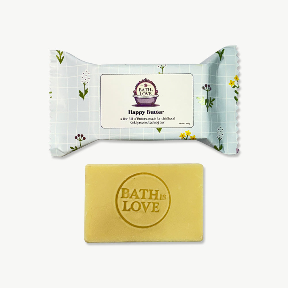 Bar of soap with 'Bath is Love' branding on a white background