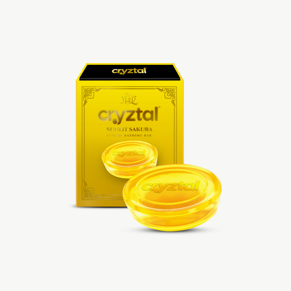 Yellow cryztal soap bars with packaging on a white background