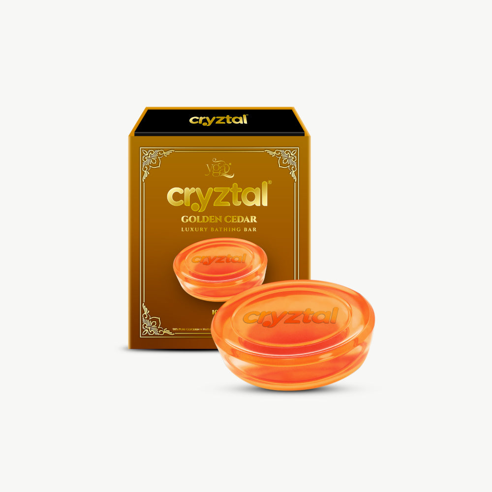 Orange soap bars with 'cryztal' branding on a white background